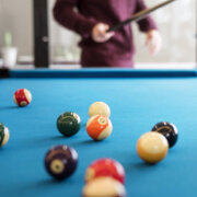 Billiard balls on a pool table